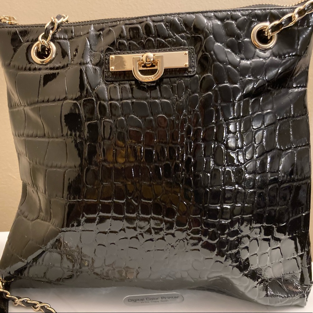 DKNY patent Leather handbag. Time to upgrade your little black bag